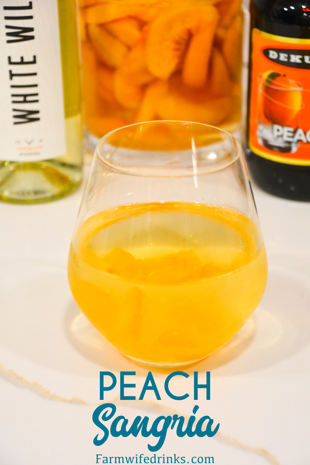 Peach Sangria is a crisp white wine sangria made with frozen peaches, peach schnapps, and vodka mixed with a bottle of white wine.