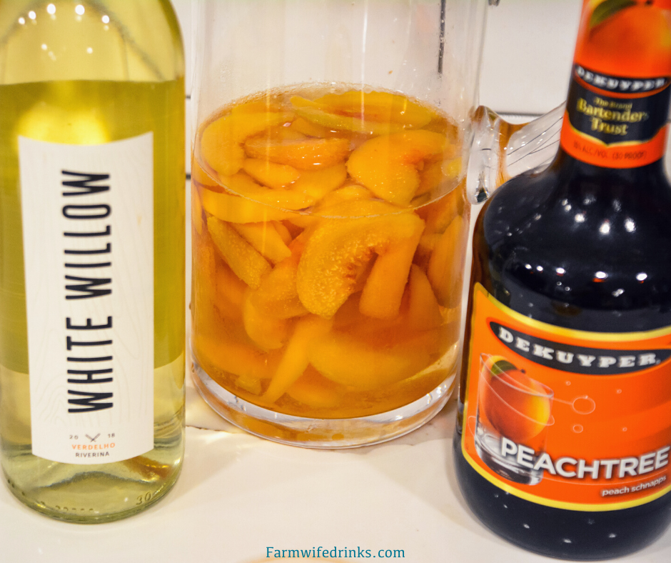 Peach Sangria is a crisp white wine sangria made with frozen peaches, peach schnapps, and vodka mixed with a bottle of white wine.