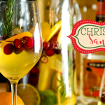 This Fireball Sangria recipe is a crisp white wine sangria with a strong cinnamon flavor. Subtle hints of orange, cranberry, and apple make this the perfect Christmas Sangria.