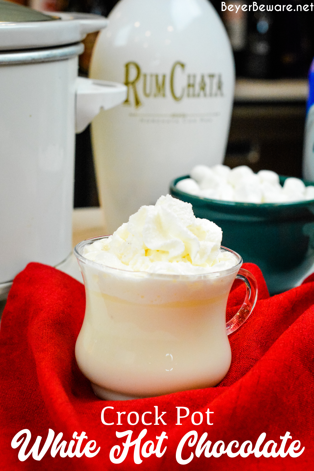 Crock Pot White Hot Chocolate recipe is one of the most decadent hot drink recipes that is perfect with a little Rumchata.