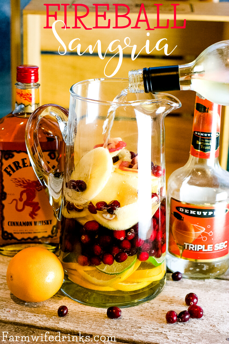 This Fireball Sangria recipe is a crisp white wine sangria with a strong cinnamon flavor. Subtle hints of orange, cranberry, and apple make this the perfect Christmas Sangria.