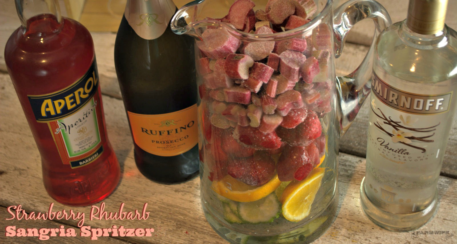 Strawberry Rhubarb Sangria Spritzer combines the summer flavors to make a flavorful sangria all year round thanks to frozen rhubarb and strawberries.