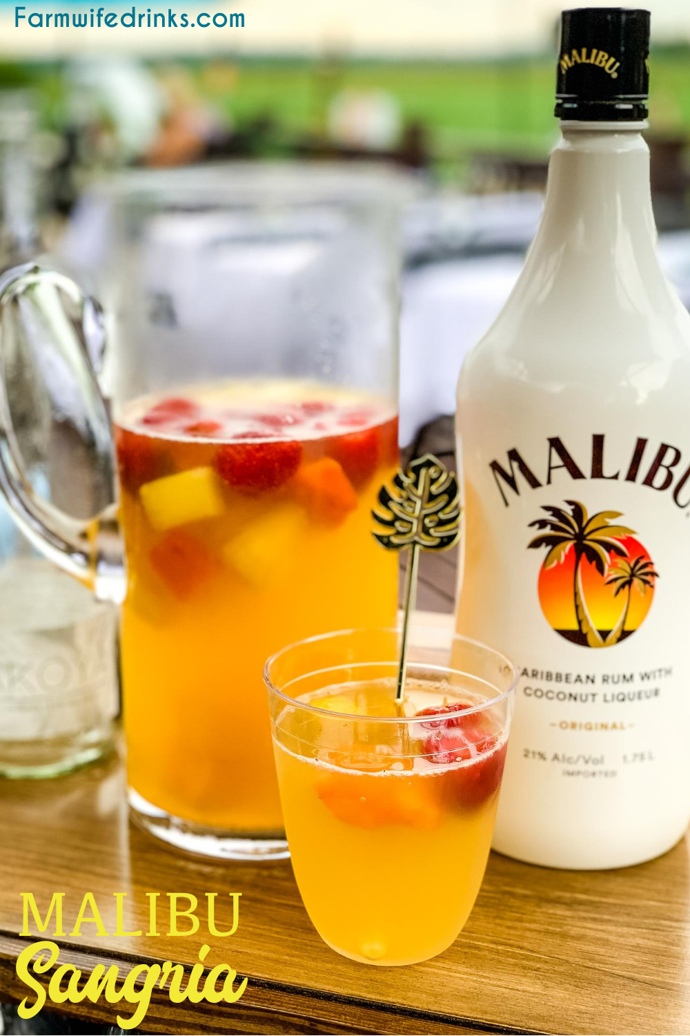 Malibu sangria recipe is a simple and perfect tropical drink for a summer day pool cocktail made with white wine, Malibu Rum, pineapple juice, and tropical frozen fruit like pineapple and mangos.