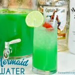 Mermaid water aka boujie fancy swamp water is the perfect spiked punch for summer sipping with the combination of limeade, pineapple juice, Captain Morgan, Malibu, and blue curacao.