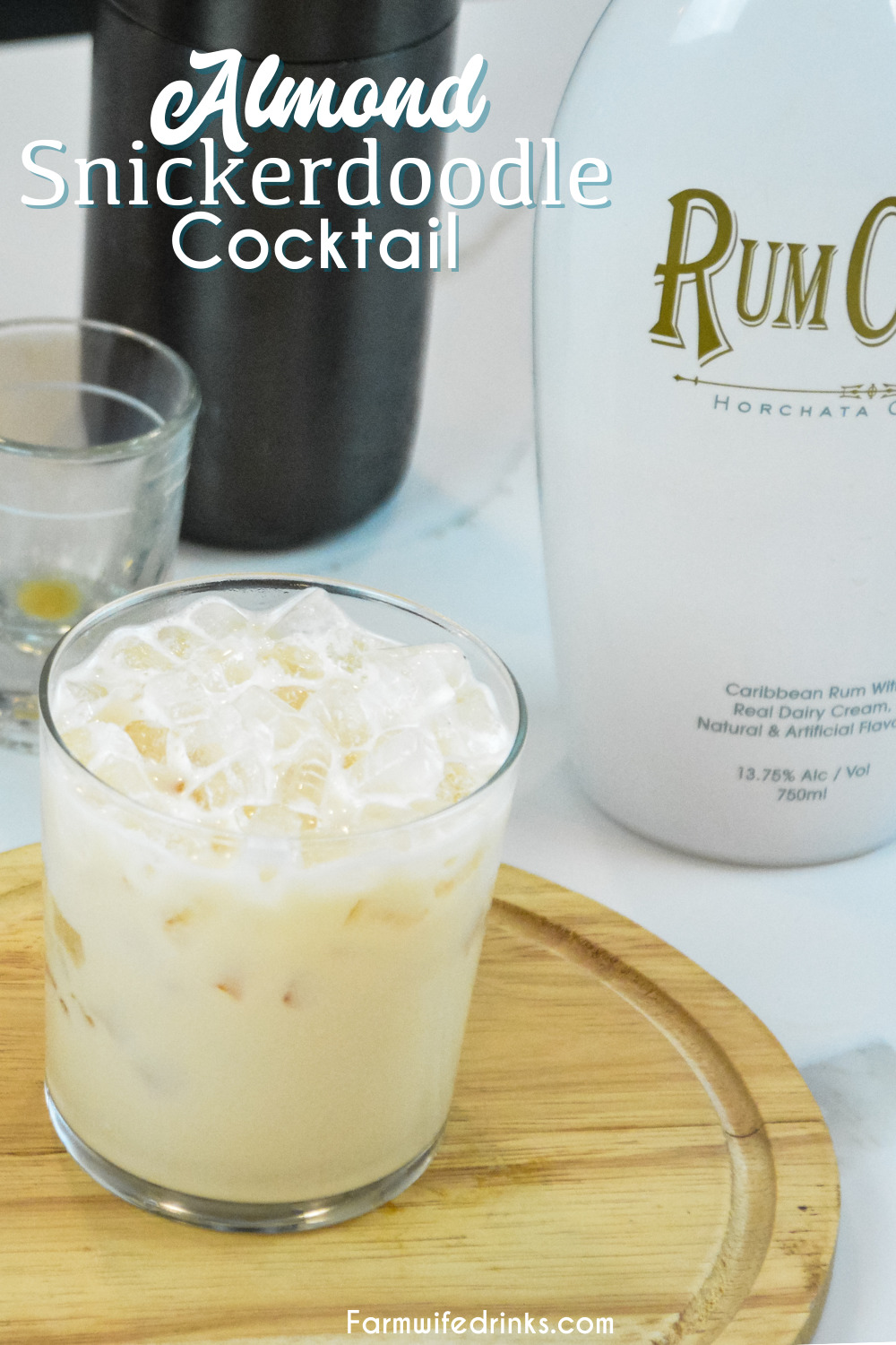 Almond snickerdoodle cocktail is the smooth almond and cinnamon after dinner drink that is made by shaking Rumchata and amaretto together and then serving over ice.