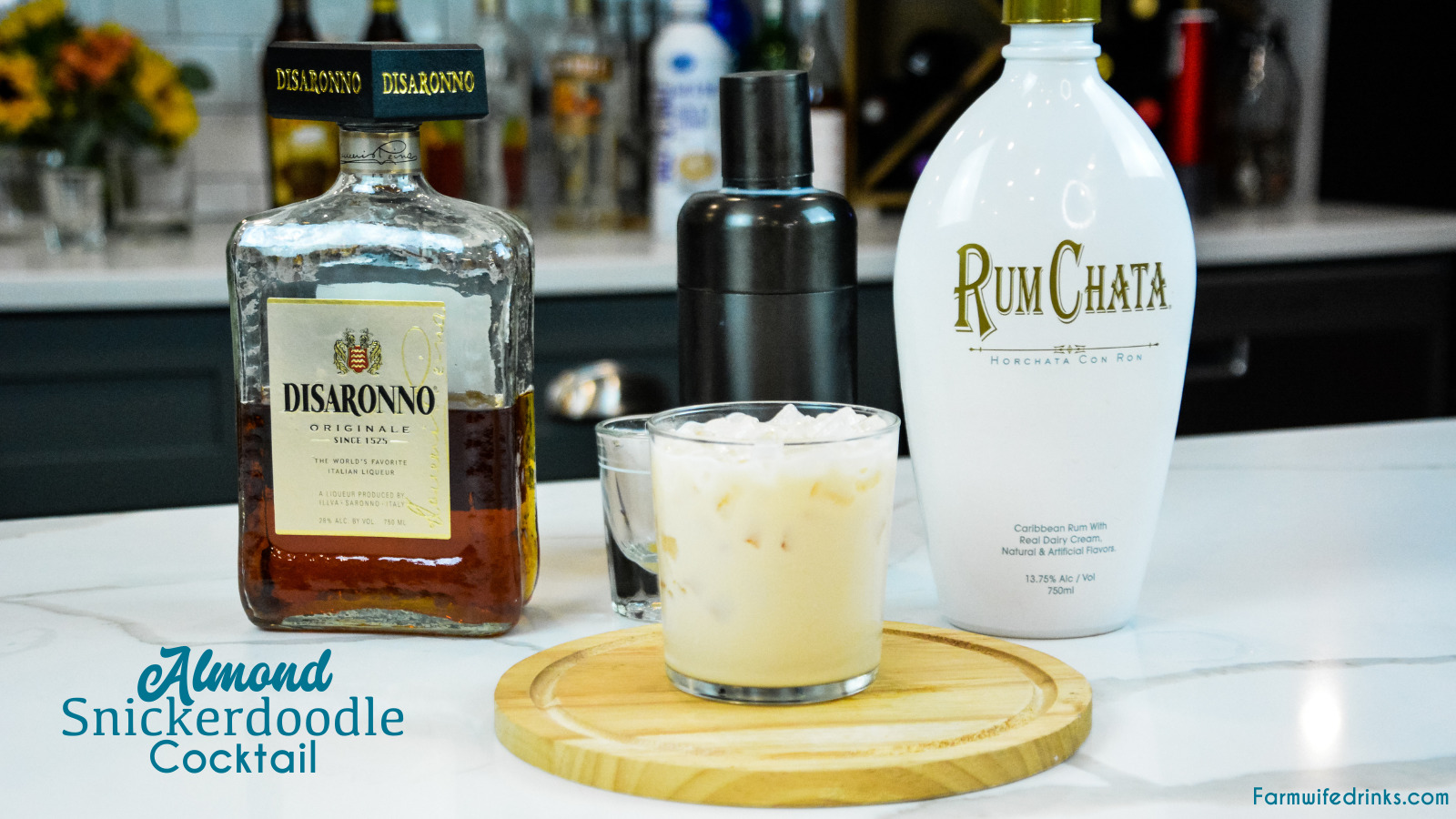 Almond snickerdoodle cocktail is the smooth almond and cinnamon after dinner drink that is made by shaking Rumchata and amaretto together and then serving over ice.