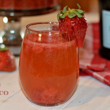 This Strawberry Prosecco Punch recipe is the perfect cocktail recipe for a crowd, wedding shower, or pool party.