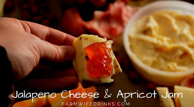 A perfect appetizer is pepper jack cheese with apricot jam on a crunchy cracker. It is the perfect combination of flavors.