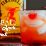 Fireball cherry apple bomb cocktail takes fall flavors up a notch with real apple cider and Fireball whisky with cherries and grenadine for the best-iced fall cocktail.