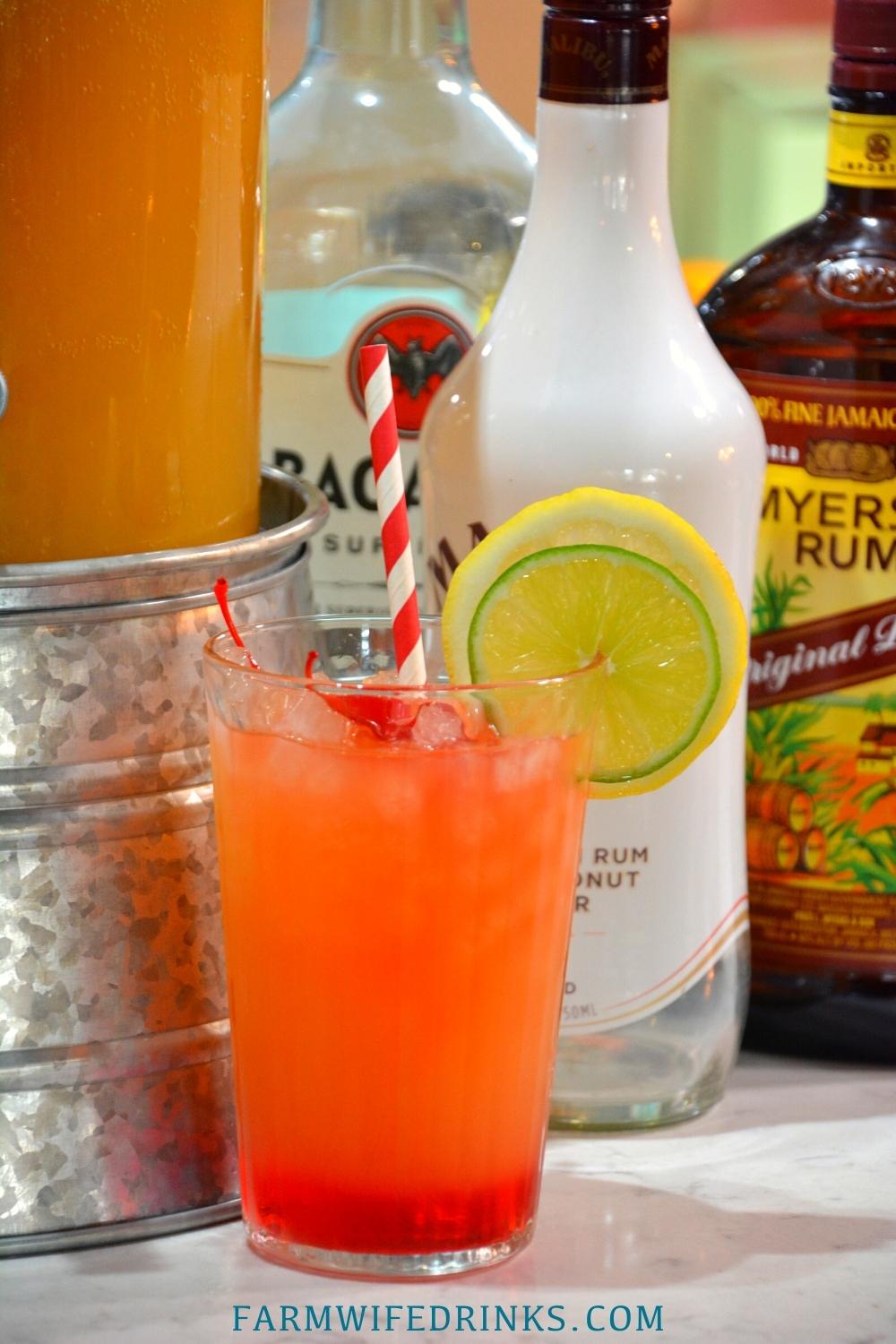 3 rum punch recipe is the sweet combination of pineapple, lime and orange juices with dark, white, and coconut rums to combine for a great party drink.