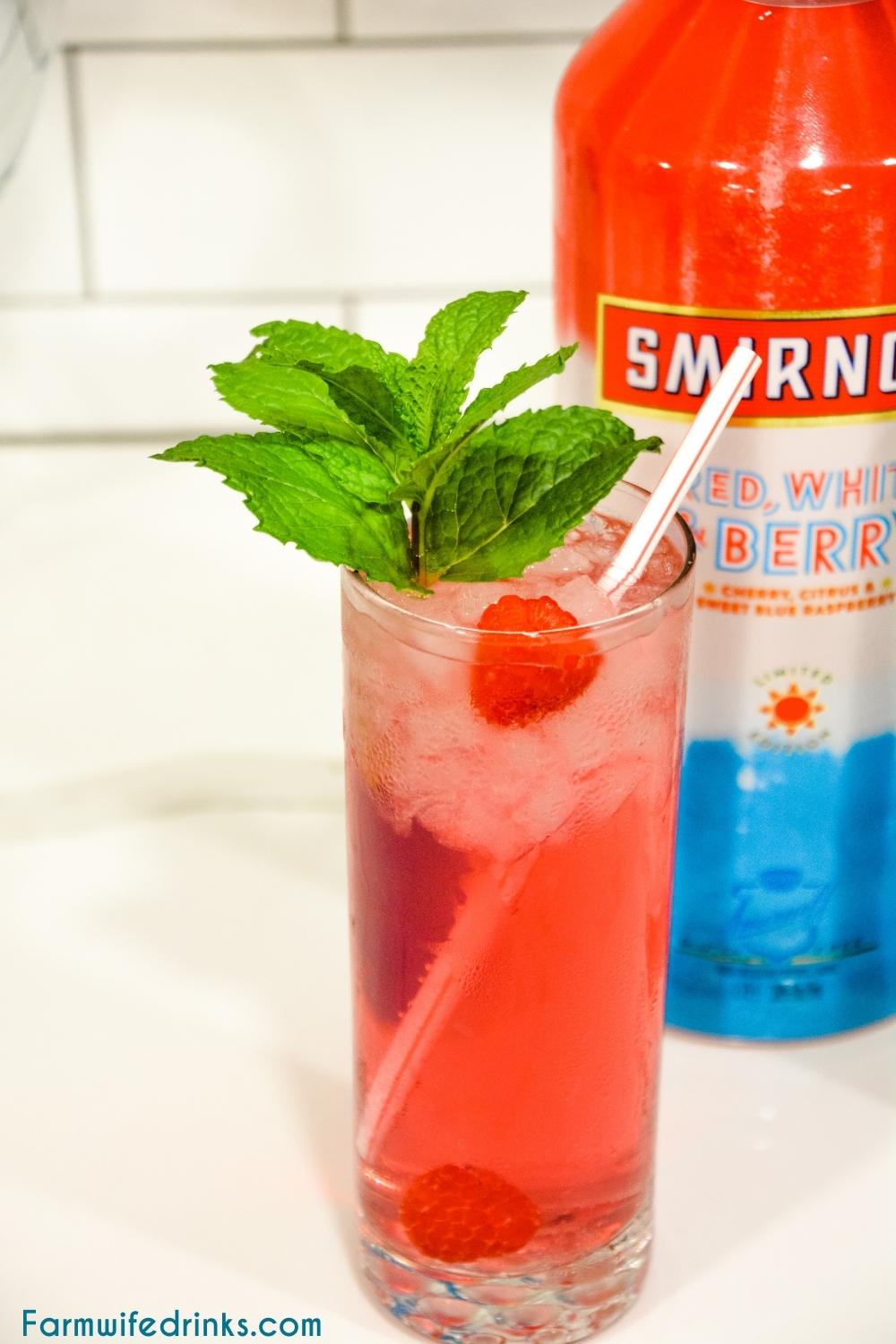 I love a low-calorie cocktail and this berry vodka cocktail with the fun red, white and berry Smirnoff Vodka mixed with berry lemonade is my favorite summer cocktail.