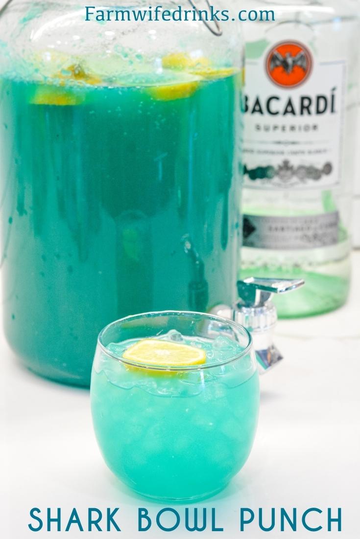 Blue Rum Punch Bowl is like the shark bowls from college made with pineapple juice, blue raspberry kool-aid, and rum.