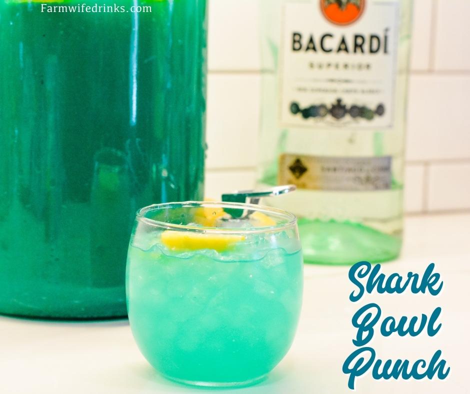Blue Rum Punch Bowl is like the shark bowls from college made with pineapple juice, blue raspberry kool-aid, and rum.