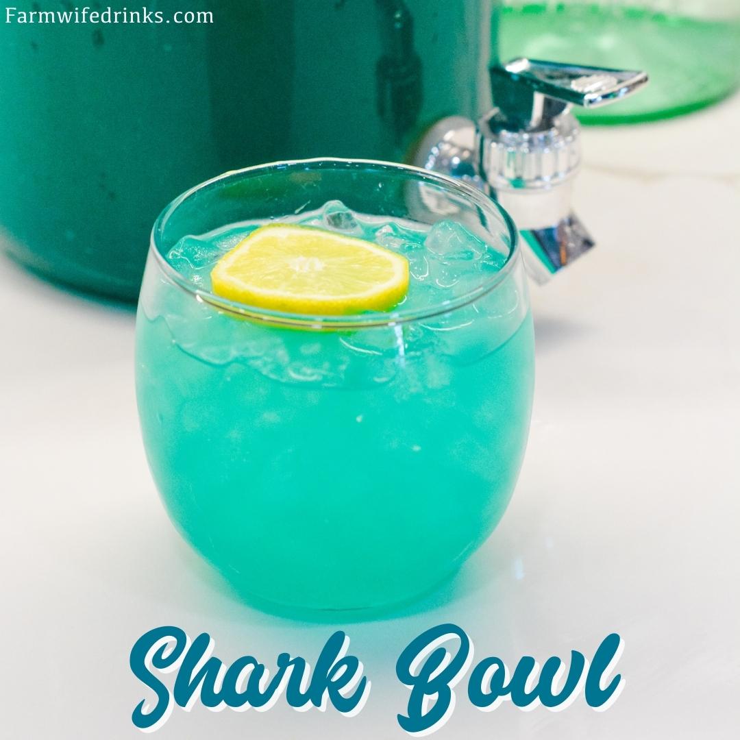 Blue Rum Punch Bowl is like the shark bowls from college made with pineapple juice, blue raspberry kool-aid, and rum.