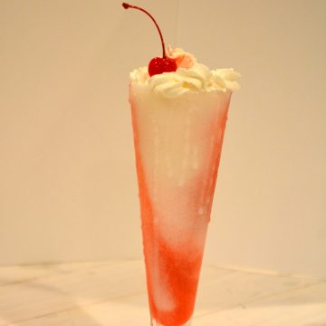 The combination of strawberry daiquiri with a pina colada create a Miami Vice. This magical drink is perfect for sipping on the beach or poolside or on your couch when you are dreaming of those places.