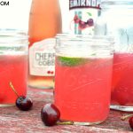 The sweet and tart combination of the new cherry cobbler wine from Oliver WInery with limeade, cherry vodka, and some maraschino cherries make this a perfect summer sangria recipe.