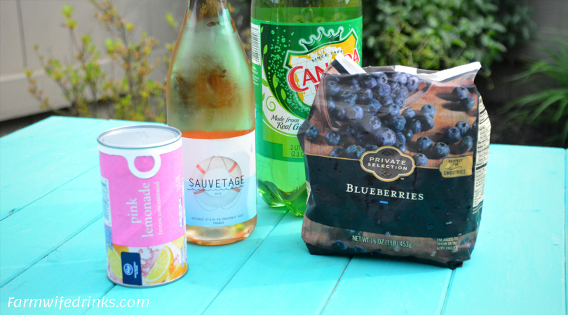 Rosé Spritzer is the sweet combination of rosé wine with tangy lemonade and ginger ale combined with blueberries and lemon slices for a refreshing summer lemonade rosé sangria.