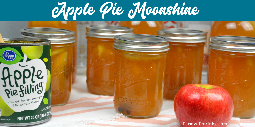 Apple pie moonshine combines apple cider and juice with apple pie filling with cinnamon sticks and vanilla with moonshine and vanilla vodka to create your new favorite fall liquor to drink.