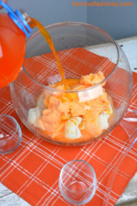 Orange punch can be the sweet combination of orange sherbet, vanilla ice cream with orange Hawaiian Punch and a bit of Sprite to give it a little fizz to create this fun creamy orange sherbet punch. #Sherbet #PunchRecipes #OrangeFood #OrangeTheme #Halloween