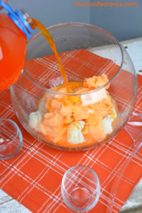 Orange punch can be the sweet combination of orange sherbet, vanilla ice cream with orange Hawaiian Punch and a bit of Sprite to give it a little fizz to create this fun creamy orange sherbet punch. #Sherbet #PunchRecipes #OrangeFood #OrangeTheme #Halloween