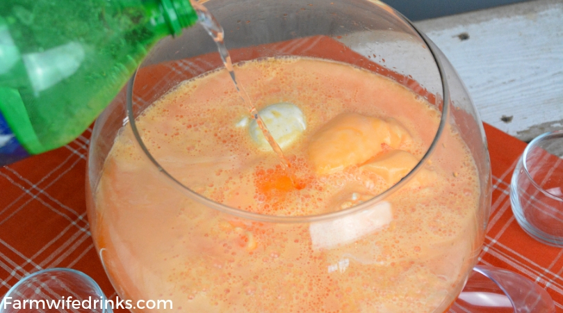 Orange punch can be the sweet combination of sherbet, vanilla ice cream with orange Hawaiian Punch and a bit of Sprite to give it a little fizz to create this fun creamy sherbet punch. #Sherbet #PunchRecipes #OrangeFood #OrangeTheme #Halloween