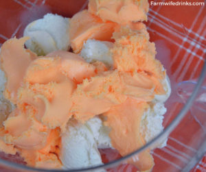 Orange punch can be the sweet combination of orange sherbet, vanilla ice cream with orange Hawaiian Punch and a bit of Sprite to give it a little fizz to create this fun creamy orange sherbet punch. #Sherbet #PunchRecipes #OrangeFood #OrangeTheme #Halloween