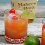 Whiskey Sours is limeade and whiskey combine and stirred in with a smidge of orange juice and grenadine. #Whiskey #Whisky #WhiskeySours #Cocktails #Cocktail