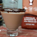 A Chocolate Milk Martini combines vanilla vodka, creme de cocoa in a hot fudged rimmed martini glass for the adult version of the best kind of milk, chocolate milk. #ChocolateMartini #Martini #Vodka #Cocktails #ChocolateMilk