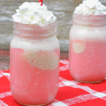 Cherry Floats are the perfect Valentine's Day or baby shower party drink that are easy to make with just Cherry 7-Up, vanilla ice cream, and whipped cream. #Floats #PinkDrinks #IceCream #IceCreamFloats #ValentinesDay #BabyShowers #PrincessParty
