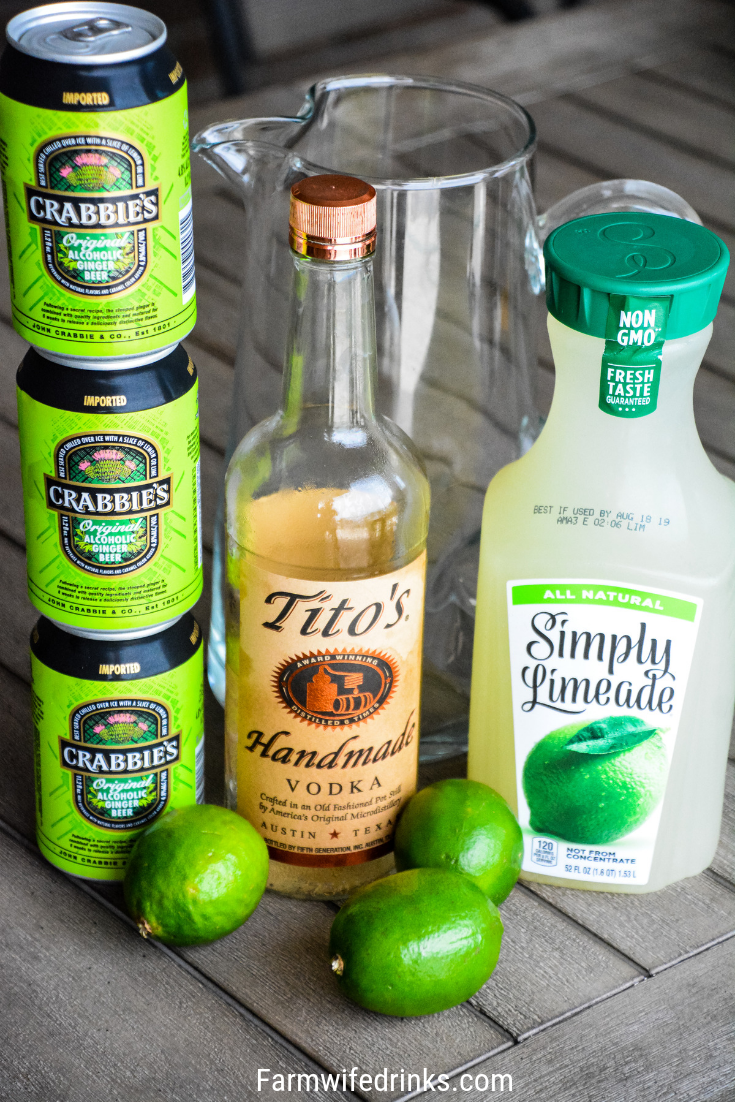 Moscow Mule Punch is the perfect large batch cocktail recipe combining limeade, ginger beer, and vodka great for tailgates, pool parties and BBQs. #Vodka #CocktailRecipe #Cocktails #MoscowMule #Beer #LargeBatchCocktails