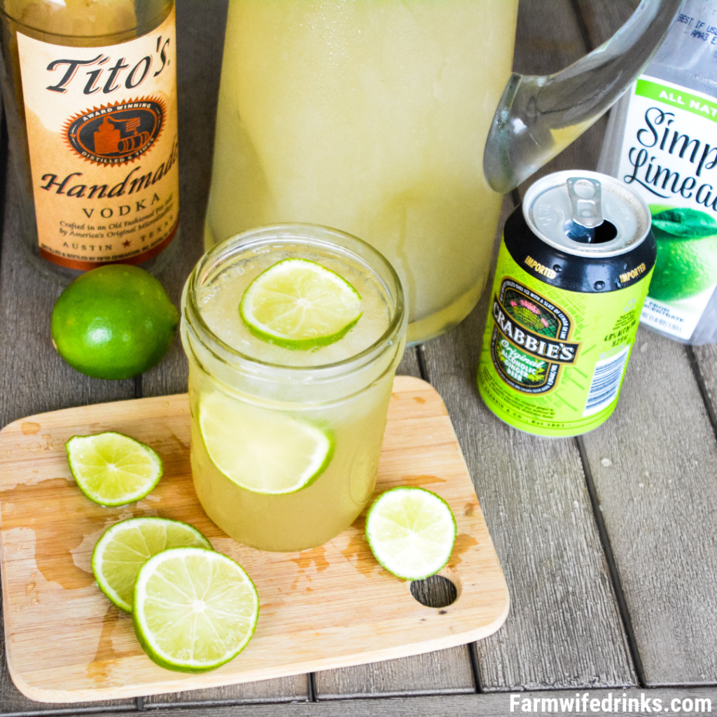 Moscow Mule Punch is the perfect large batch cocktail recipe combining limeade, ginger beer, and vodka great for tailgates, pool parties and BBQs.