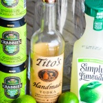 Moscow Mule Punch is the perfect large batch cocktail recipe combining limeade, ginger beer, and vodka great for tailgates, pool parties and BBQs. #Vodka #CocktailRecipe #Cocktails #MoscowMule #Beer #LargeBatchCocktails