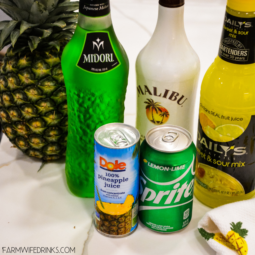 Green Hawaiian Cocktail combines all the tropical flavors of pineapple, melon, coconut, and citrus with Midori, Malibu Rum, pineapple juice, and lemon-lime soda for the best beach or pool cocktail.