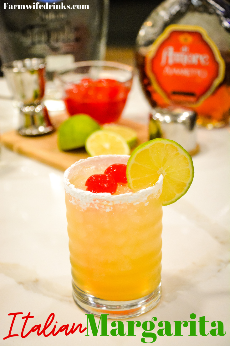 This Italian Margarita is a simple cocktail recipe made with tequila, amaretto, triple sec, and sour mix, poured into a powdered sugar rimmed glass.