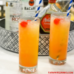 Yellow Hammer Slammer drink is strong cocktail perfect for tailgate parties and can be made by the pitcher or one at a time by stirring together vodka, rum, amaretto, pineapple juice, and OJ.