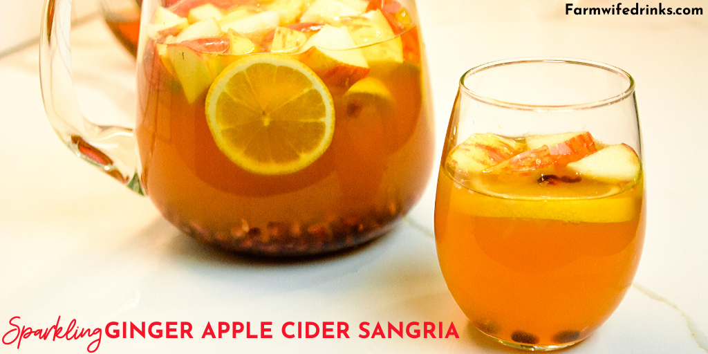 Sparkling ginger apple cider sangria is the rich flavors of apple cider, ginger liqueur, prosecco with hints of lemon and pomegranate for a satisfying fall sangria recipe. #Sangria #Cocktails #FallRecipes #Drinks #AppleCider