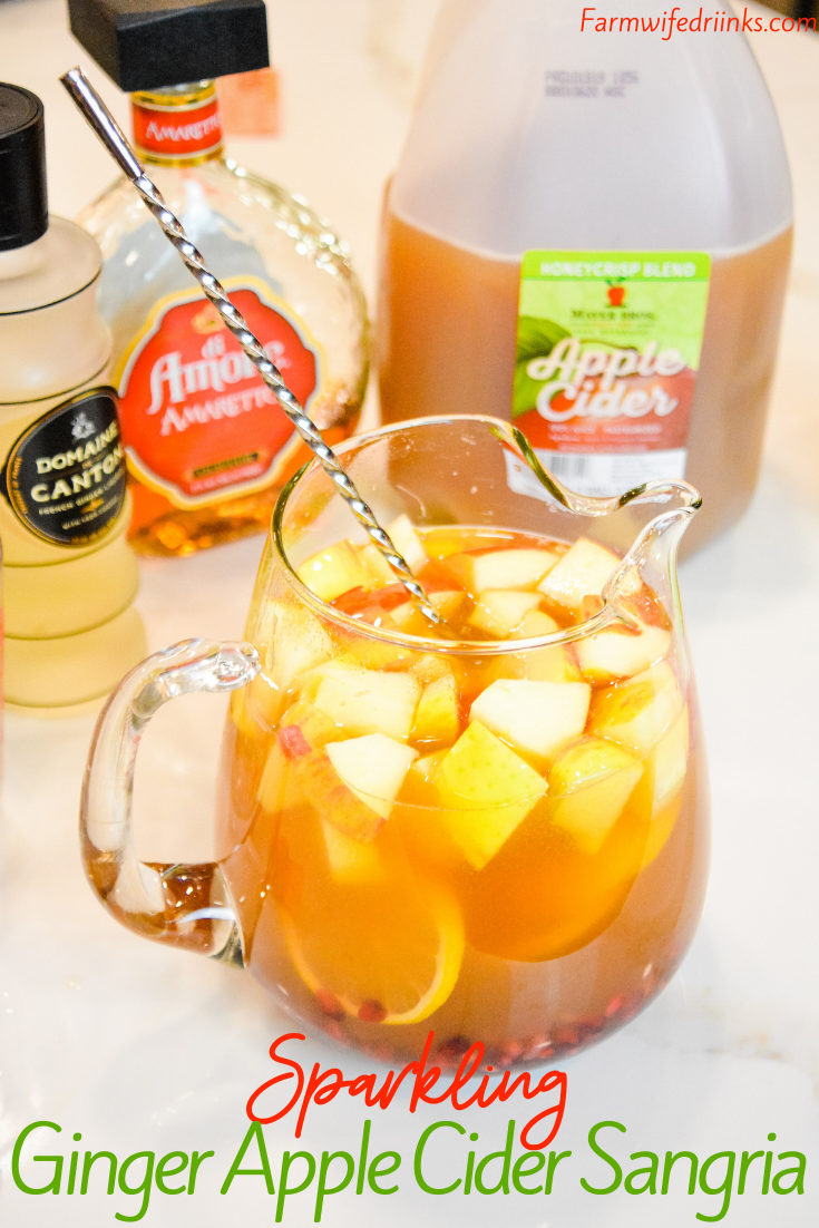 Sparkling ginger apple cider sangria is the rich flavors of apple cider, ginger liqueur, prosecco with hints of lemon and pomegranate for a satisfying fall sangria recipe. #Sangria #Cocktails #FallRecipes #Drinks #AppleCider