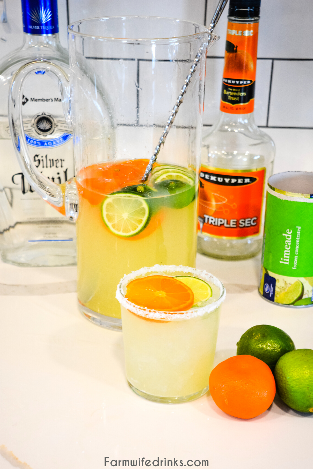 Limeade margaritas are the sweet blend of three easy ingredients to make easy margaritas by the pitcher by mixing together a can of frozen limeade, triple sec, and tequila.