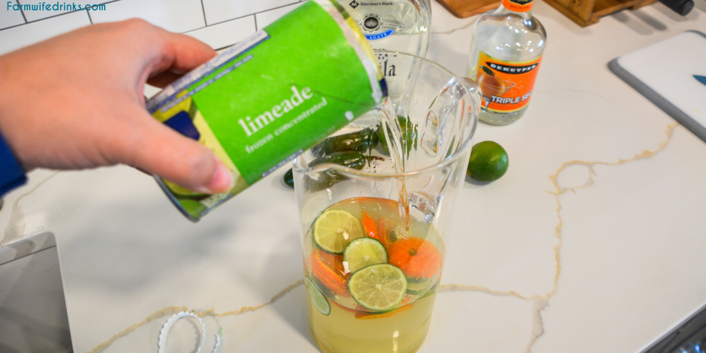 Limeade margaritas are the sweet blend of three easy ingredients to make easy margaritas by the pitcher by mixing together a can of frozen limeade, triple sec, and tequila.