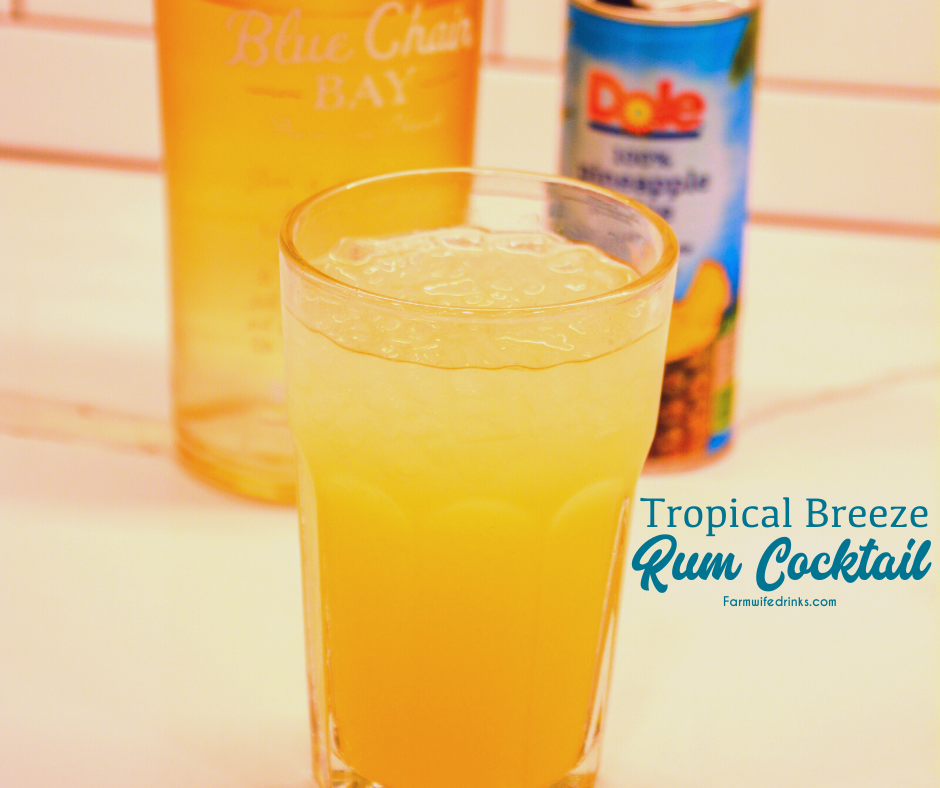 Tropical breeze rum drink is a combination of pineapple juice and banana rum with a splash of lemon-lime soda for the delicious Caribbean pineapple banana rum cocktail