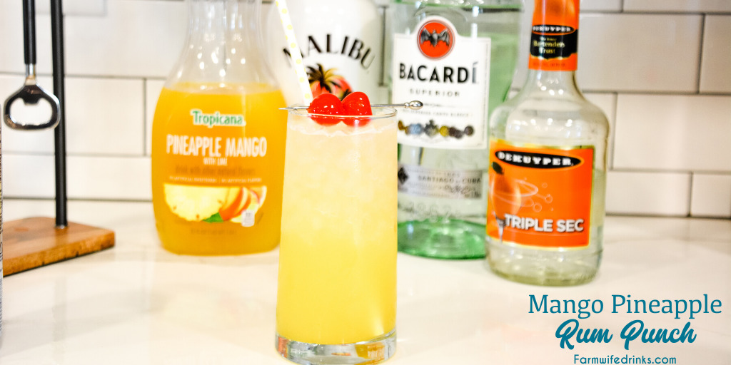 Mango Pineapple Rum Punch combines mango-pineapple juice with triple sec, Malibu rum, and white rum for a smooth Hawaiian rum cocktail that can be topped off with pineapple sparkling water.