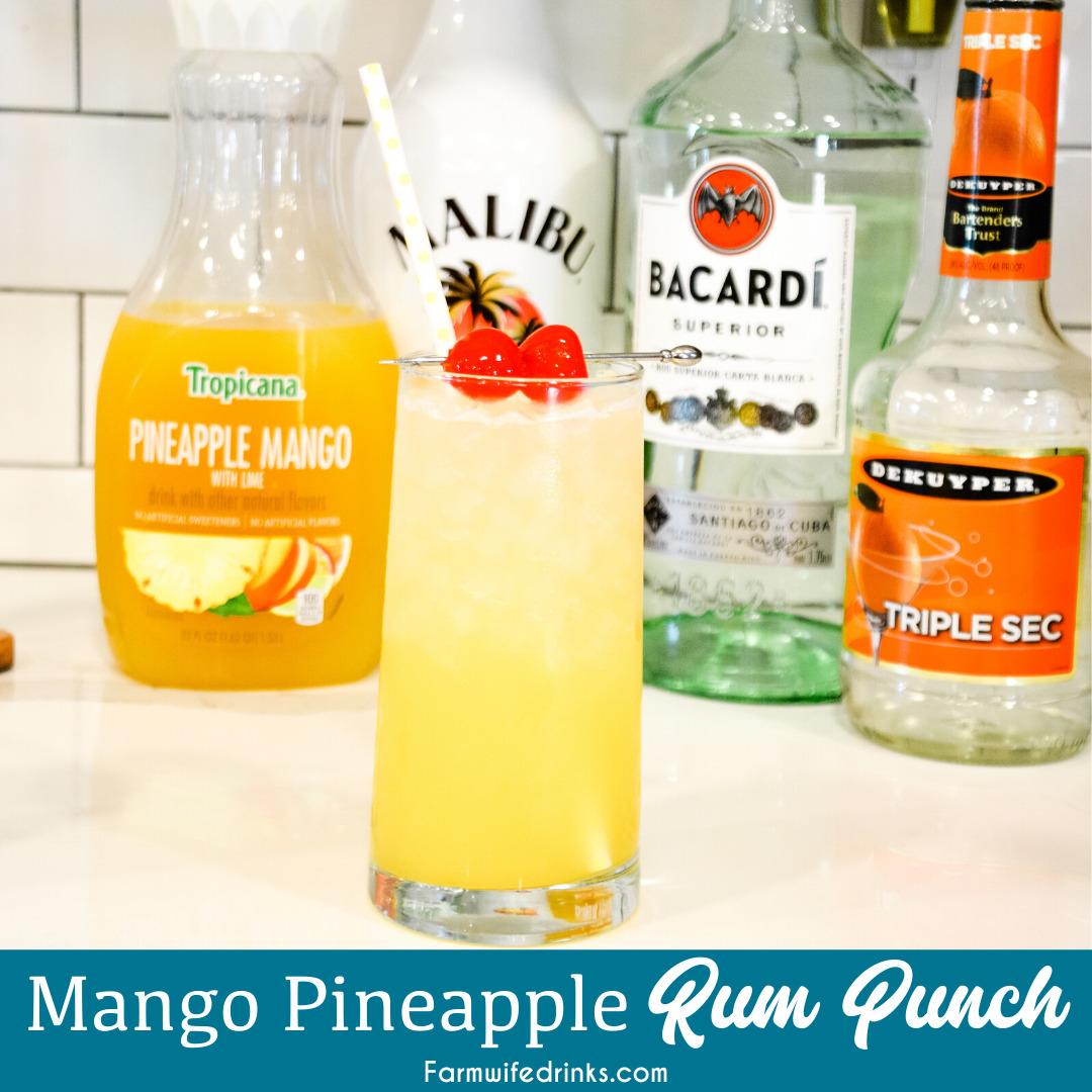 Mango Pineapple Rum Punch combines mango-pineapple juice with triple sec, Malibu rum, and white rum for a smooth Hawaiian rum cocktail that can be topped off with pineapple sparkling water.