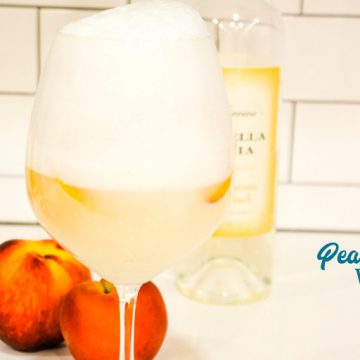 Peaches and Cream Wine Float Recipes combines a Moscato wine with vanilla bean ice cream and fresh peaches for the most decadent white wine float that can also serve for an amazing dessert drink.