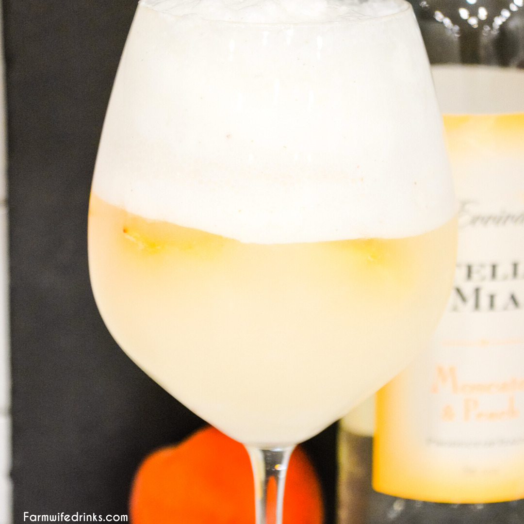 Peaches and Cream Wine Float Recipes combines a Moscato wine with vanilla bean ice cream and fresh peaches for the most decadent white wine float that can also serve for an amazing dessert drink.