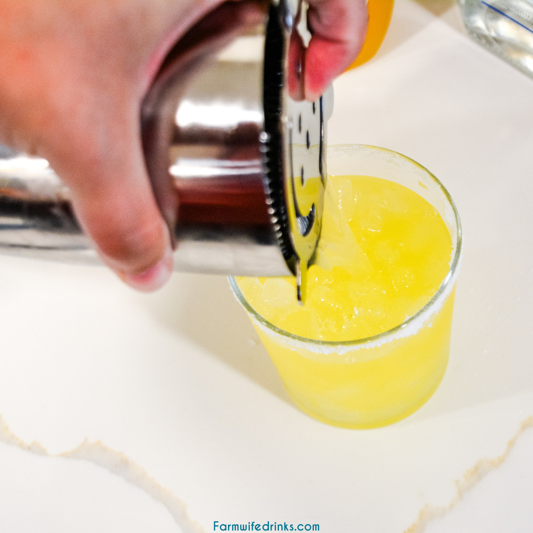 Pineapple mango margaritas are a simple three-ingredient margarita that is better than any mango margarita made with sweet and sour with the simple ingredients of pineapple mango juice, tequila, and Cointreau.