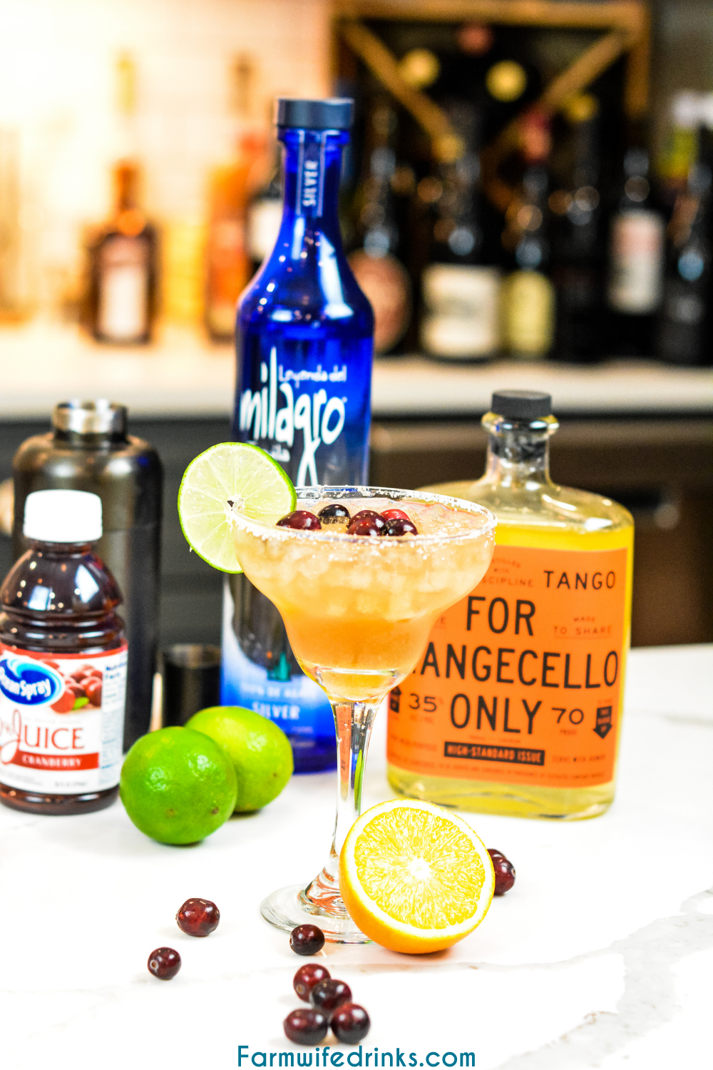 Cranberry orange margaritas are the combination of orangecello and tequila with orange, cranberry and lime juices to make a margarita that tastes like Christmas.