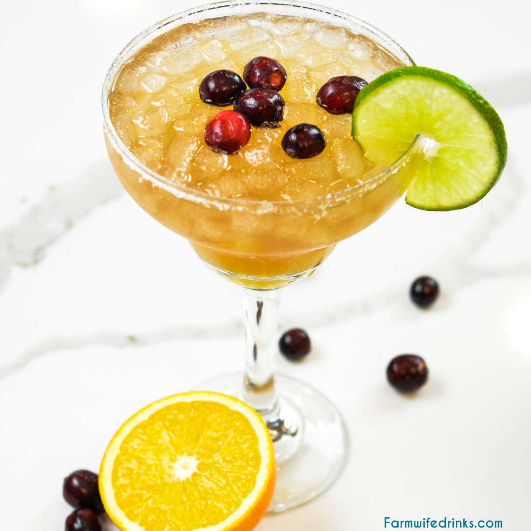 Cranberry orange margaritas are the combination of orangecello and tequila with orange, cranberry and lime juices to make a margarita that tastes like Christmas.