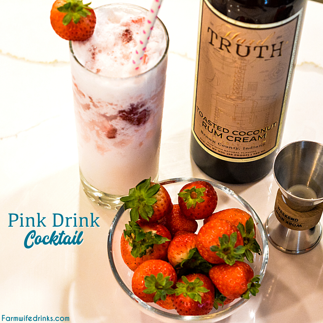 Pink drink cocktail is a yummy toasted coconut rum cream mixed with strawberries and sparkling water to make this delicious strawberry coconut cream rum cocktail.