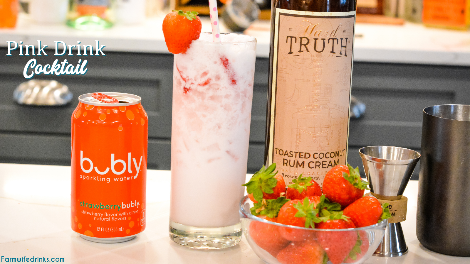 Pink drink cocktail is a yummy toasted coconut rum cream mixed with strawberries and sparkling water to make this delicious strawberry coconut cream rum cocktail.