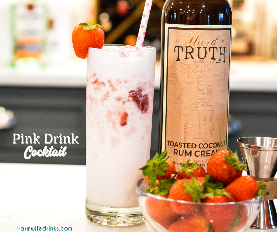 Pink drink cocktail is a yummy toasted coconut rum cream mixed with strawberries and sparkling water to make this delicious strawberry coconut cream rum cocktail.